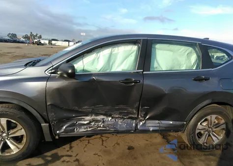 2019 Honda Cr-V Lx z USA, uszkodzony, nr VIN 5J6RW5H35KL001464